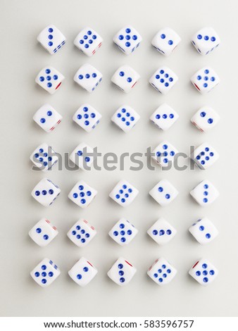 cross pattern of blue side up dice with center blank on gray background