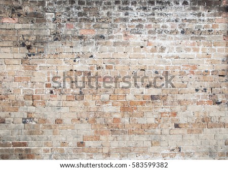 red old weathered exposed brick wall background Royalty-Free Stock Photo #583599382