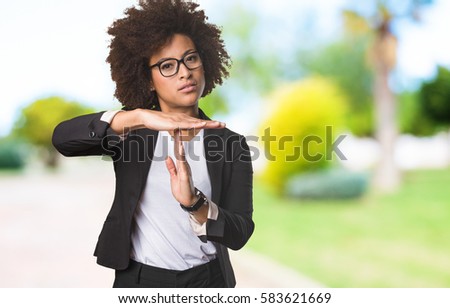 business black woman doing time break gesture