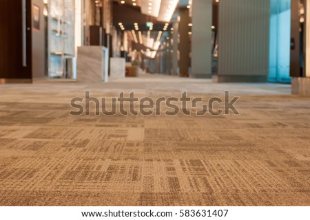 carpet floor in the modern office interior, close up on the floor  Royalty-Free Stock Photo #583631407