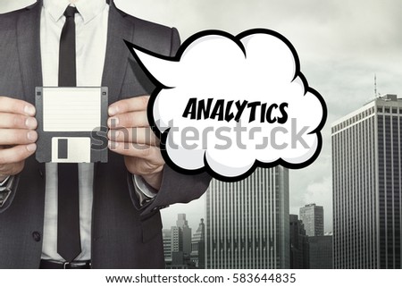 Analytics text on speech bubble with businessman