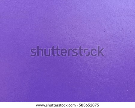 Purple concrete wall background for texture design