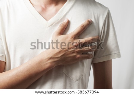 sincere man swearing with hand on heart Royalty-Free Stock Photo #583677394