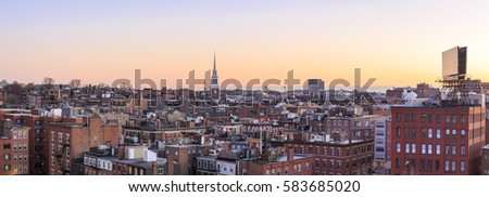 Aerial view of Boston in Massachusetts, USA at sunrise showcasing its architecture at the North End of the city.