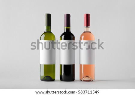 Wine Bottle Mock-Up - Three Bottles. Blank Label Royalty-Free Stock Photo #583711549