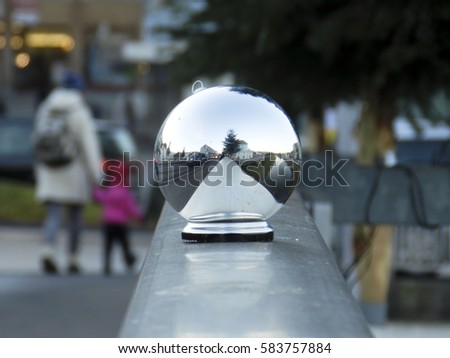 silver bright balls in street