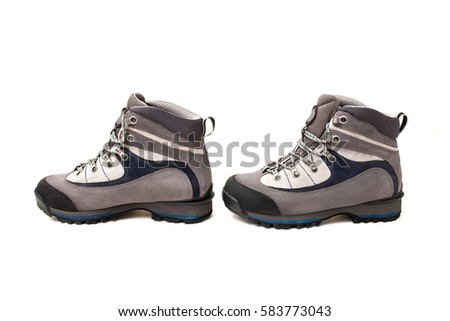 Hiking high boots isolated on white background