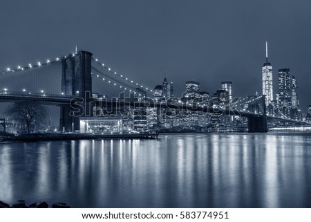 Brooklyn Bridge and the evening lights of New York City