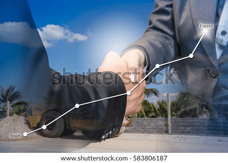 Business agreement success hand shaking about the construction of transport. The concept of work in progress to be achieved.