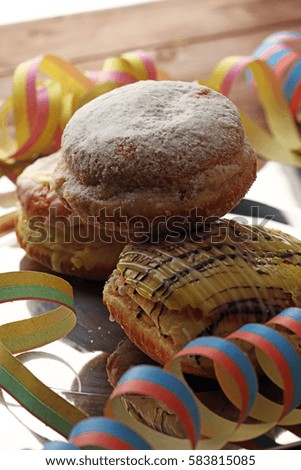 Close up Tasty Sugared Round Berliner Donuts. Carnival for Dessert on Wooden Table