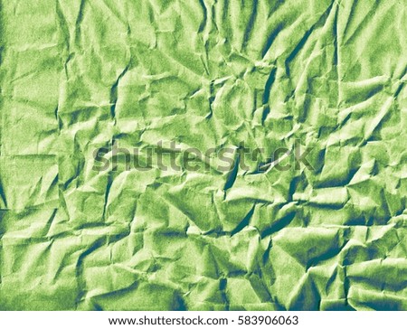 green crumpled cardboard texture with copy space