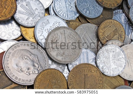 Histoical old vintage invalid money coins as background.