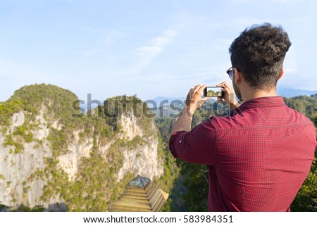 Young Man Mountains Take Photo Of Landscape On Cell Smart Phone Asian Holiday Summer Vacation Travel