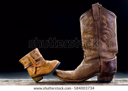 Baby cowboy boot and Dad cowboy boot with room for your type.