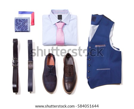 Office clothes on white blackboard. Men's classic clothing isolated. Shirt with tie, shawl, vest, belt and shoes