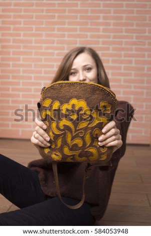 female handbag with patterns