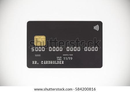 Black bank credit card on white background Royalty-Free Stock Photo #584200816