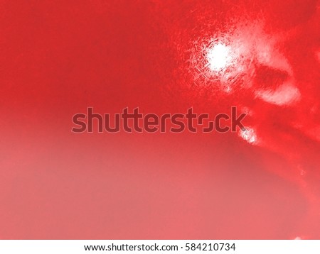 White hole design on right corner of red blur grain background with red filter effect