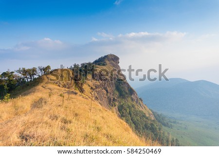 beautiful view top of mountain at evening light with blue sky in Doi Mon jong, Chiang Mai, Thailand. subject is blurred 