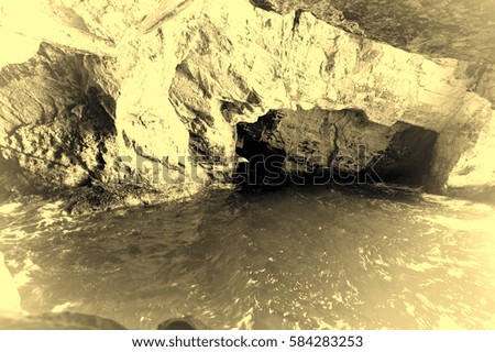 Rosh Hanikra Cliff near Israeli- Lebanese Border. Underground caves of Rosh HaNikra with sea water at the northern point of Israeli coast. Vintage style toned picture