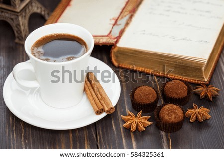 Beautiful still life with a cup of coffee and truffles- closeup shot
