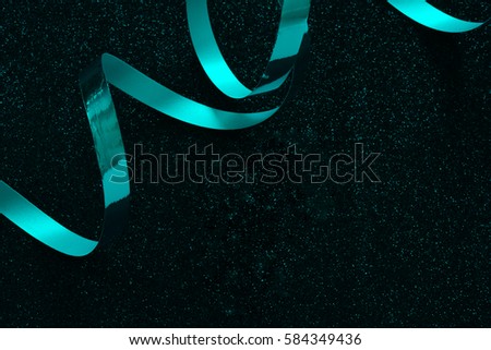  green elegant ribbon on black background