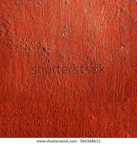 The texture of the surface is covered with orange paint