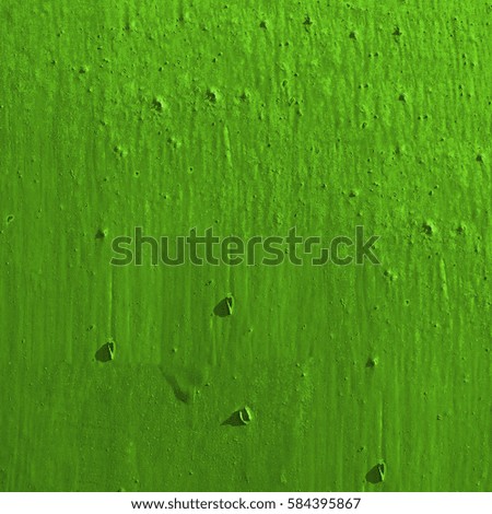 The texture of the surface is covered with green paint