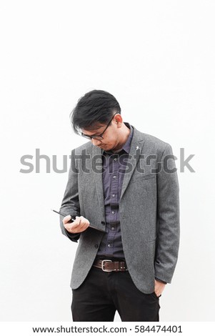 Happy business man wear glasses look at tablet on hand - happy work place