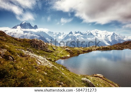 Views of the Mont Blanc glacier with Lac Blanc. Popular tourist attraction. Picturesque and gorgeous scene. Location place Nature Reserve Aiguilles Rouges, Graian Alps, France, Europe. Beauty world.