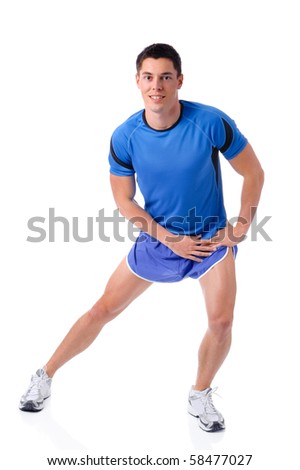 Full isolated studio picture from a young sports man