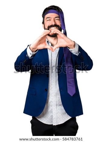 Crazy and drunk businessman making a heart with his hands