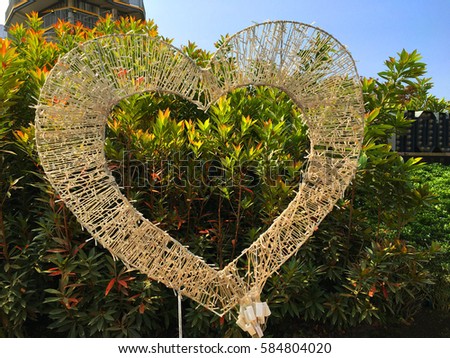 LED decorative lights on a heart-shaped frame in the park at chiang rai,Thailand.