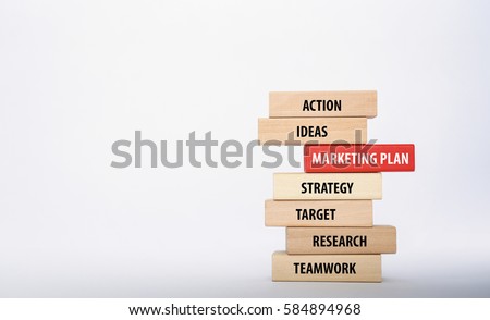MARKETING PLAN concept with Wooden Blocks