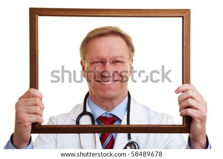 Happy senior chief physician looking through an empty frame