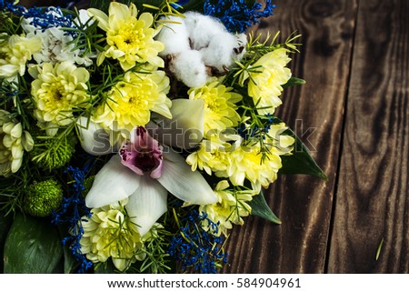 a floral bouquet of yellow daisies