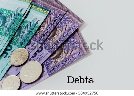 Isolated Malaysian ringgit in white background - financial concept  - Debts


