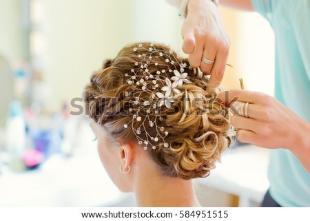 Tender wedding stylish hairstyle with accessories