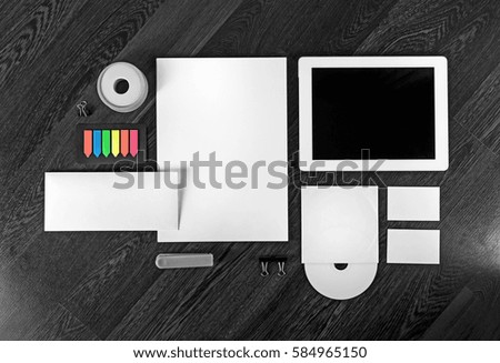 Corporate identity template on wooden table background. Photo of blank stationery set for placing your design. Top view.
