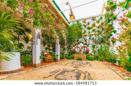 Traditional house and courts with flower in Cordoba, Spain