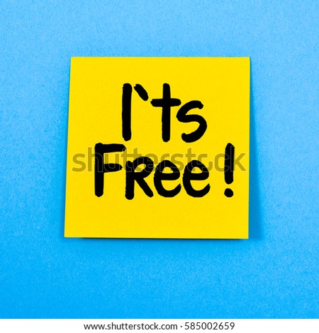 Blank note with i`ts free. Blank yellow sticky note with it`s free  word.