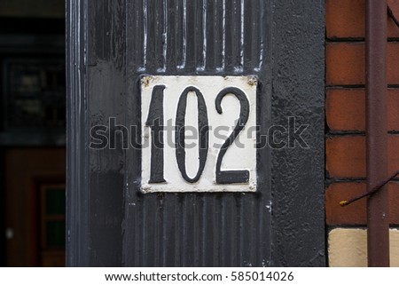 House number one hundred and two  (102).