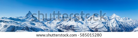 Swiss Mountains Panorama Royalty-Free Stock Photo #585015280