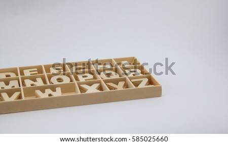Wood ABC alphabet in box.
