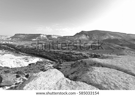 Rocky hills of the Negev Desert in Israel. Breathtaking landscape of the desert rock formations in the Southern Israel Desert. Black and white picture