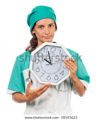Pretty nurse with a big clock