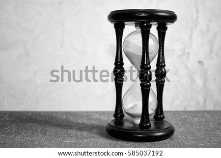 black and white photo of an hourglass
