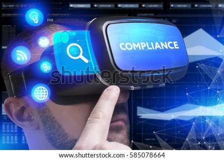 Business, Technology, Internet and network concept. Young businessman working in virtual reality glasses sees the inscription: Compliance