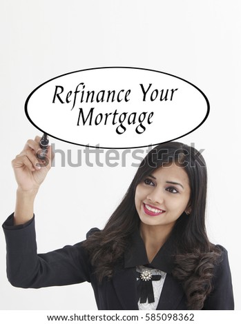 businesswoman holding a marker pen writing -refinancing your mortgage