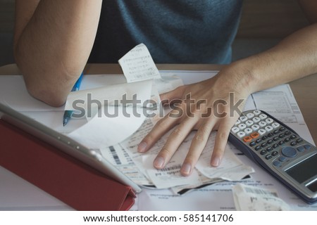  Stressed man shocked with amount to be paid for electricity,financial problem Royalty-Free Stock Photo #585141706